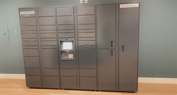 Package lockers with amazon sign on it
